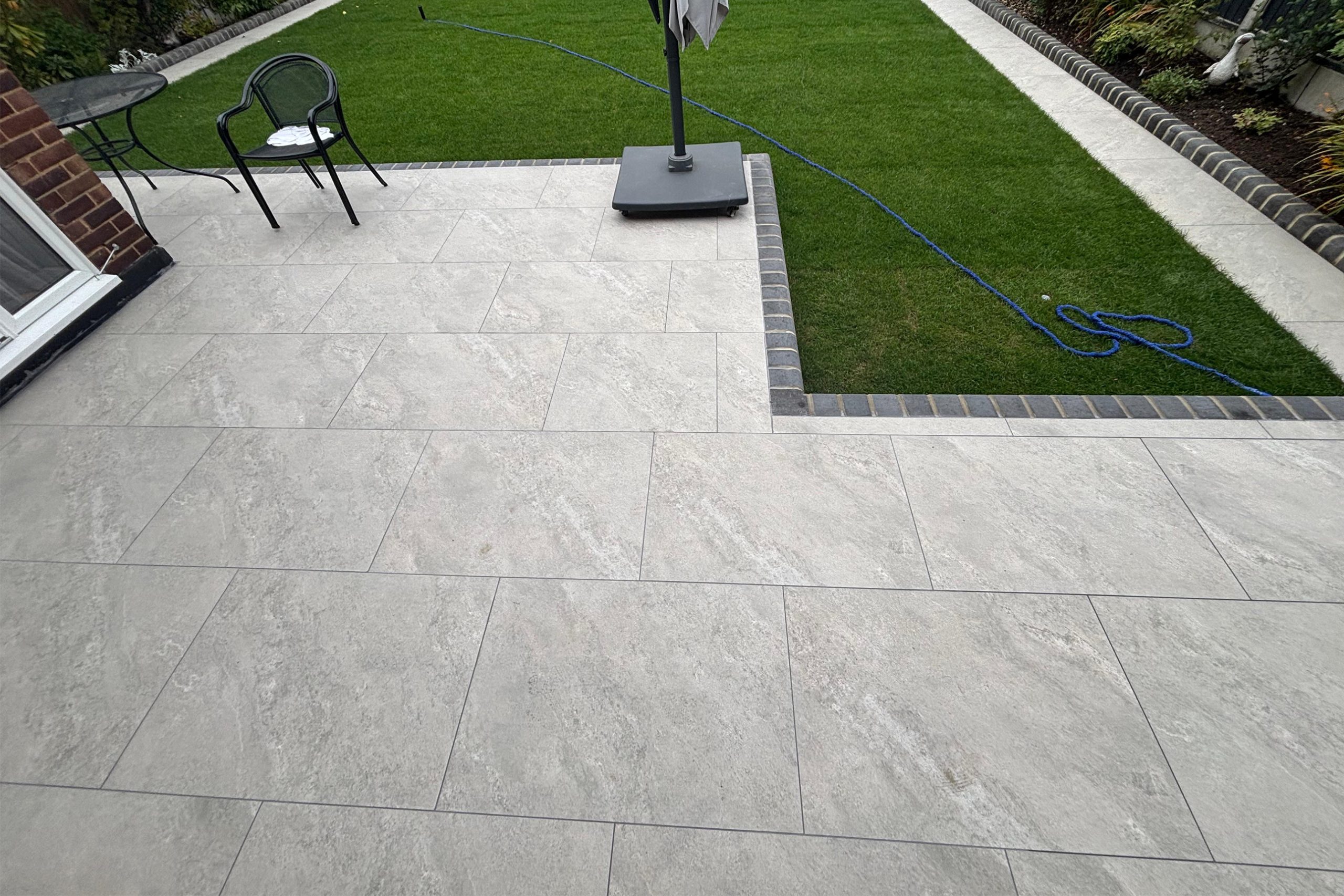 https://ddl-landscaping.co.uk/wp-content/uploads/2025/08/Smoke_grey_porcelain-002-scaled.jpg